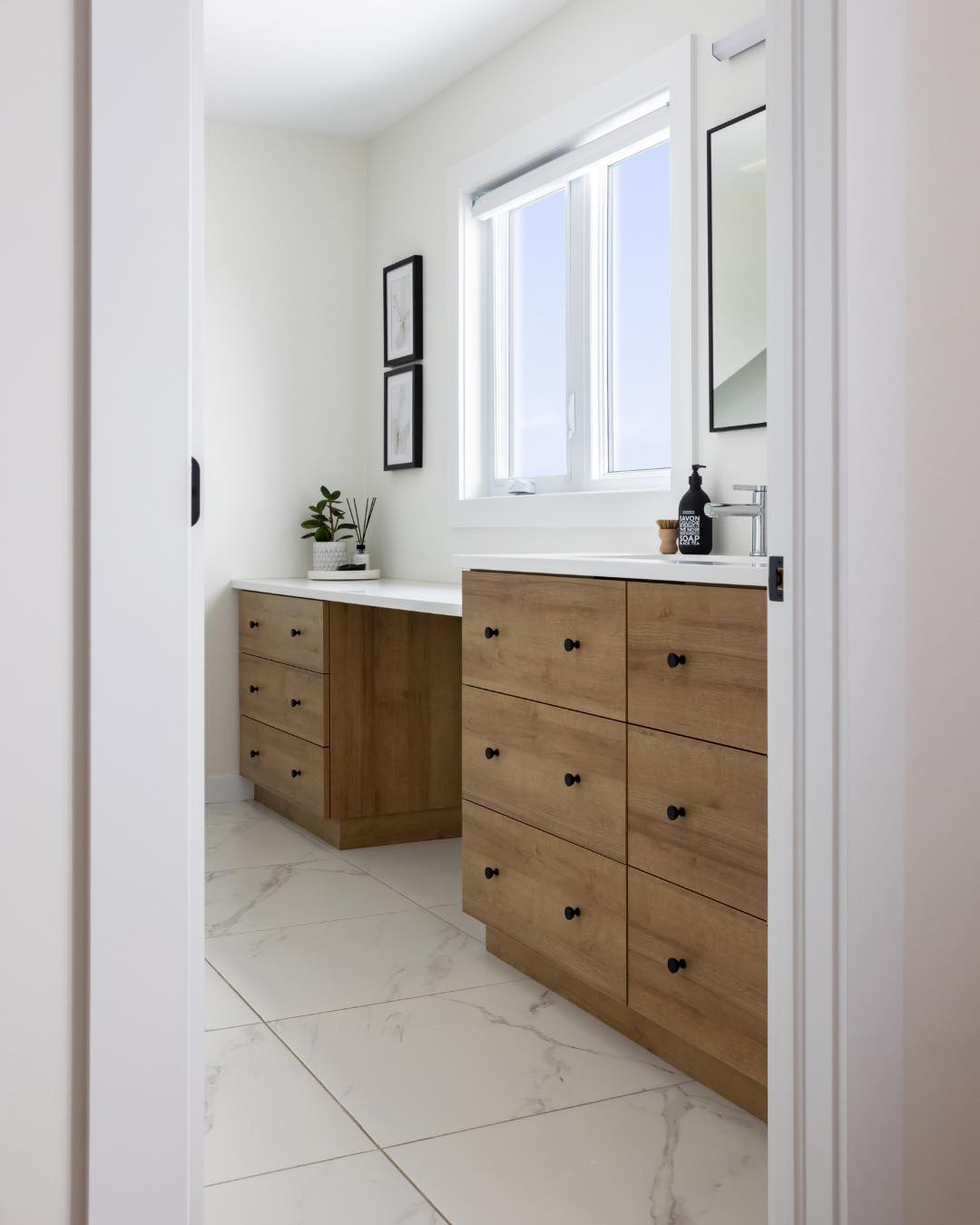 Beauty doesn't have to break the bank. With realistically crafted thermo-fused laminate panels from industry leading manufacturers, we can elevate everyday moments one detail at a time.🛁 

Can you believe this isn’t real wood?!

𝑷𝒓𝒐𝒋𝒆𝒄𝒕 𝑫𝒆𝒕𝒂𝒊𝒍𝒔
Cabinetry: Euro door in “Cannes”
Countertops: “Arctic White”

#homedesigngoals #yqghomes #lovewhereyoulive #ckont #customcabinetry #heartofthehome #windsorontario #attentiontodetail #ckhba #customcabinets #windmillcabinets #yqg #windsoressex #LivingCK #windmillcabinetshop #LHBA #WEHBA #Lambtonkent #Ldnontario