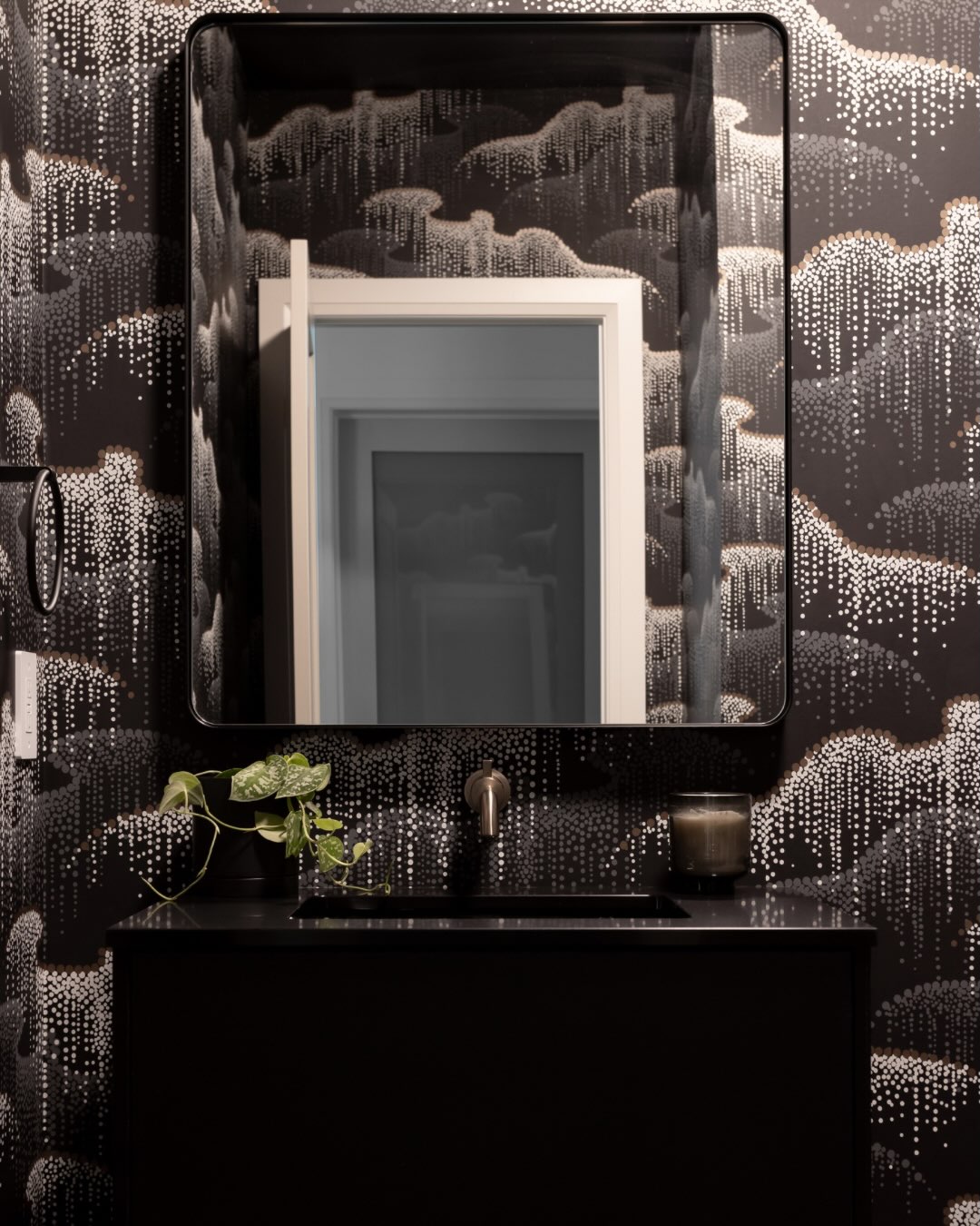 Bathrooms are such a fun place to play with design and try something different! This floating vanity was the perfect pairing to the fully wallpapered powder bath. 

Who wants to push their creative limits? We’re here for it!

Builder: Gauvin Construction
Interior Design: @cmplanningdesign 
Photography: @art_and_spaces 

#customcabinets #homeinspiration #cabinetry #southwesternontario vanitydesig